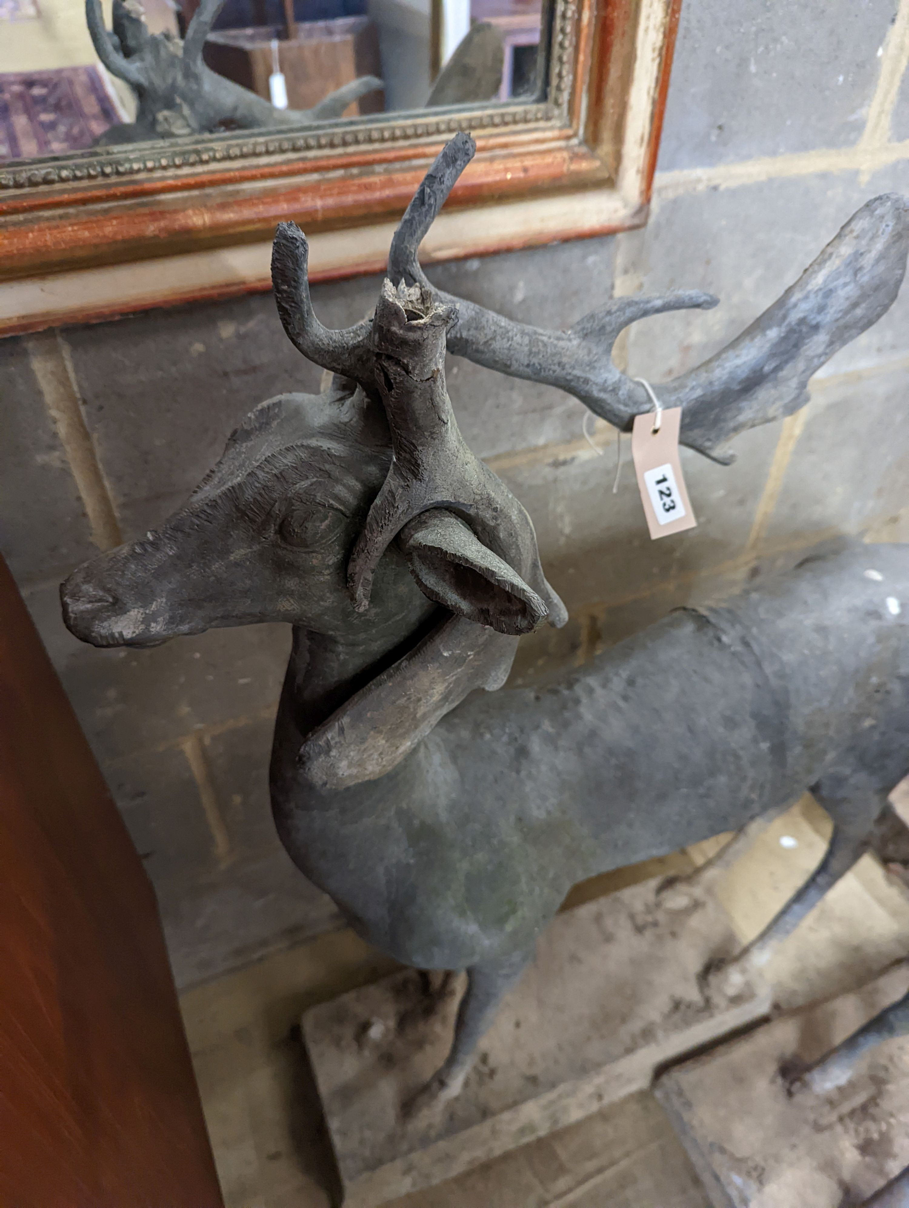 Three lead garden statues modelled as deer, largest height 105cm